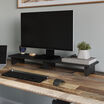desk shelf with a monitor setup on top of it 