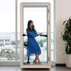 privacy booth in use with a person making a call with the door closed
